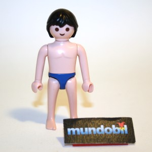 Man, black hair, small blue swim trunks 